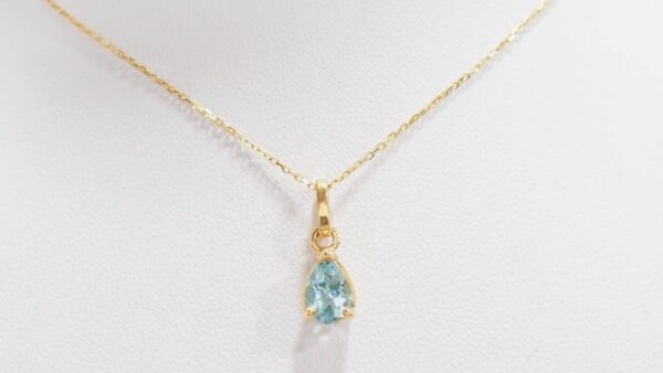 Collier Solitaire En Or Jaune Et Topaze Bleue